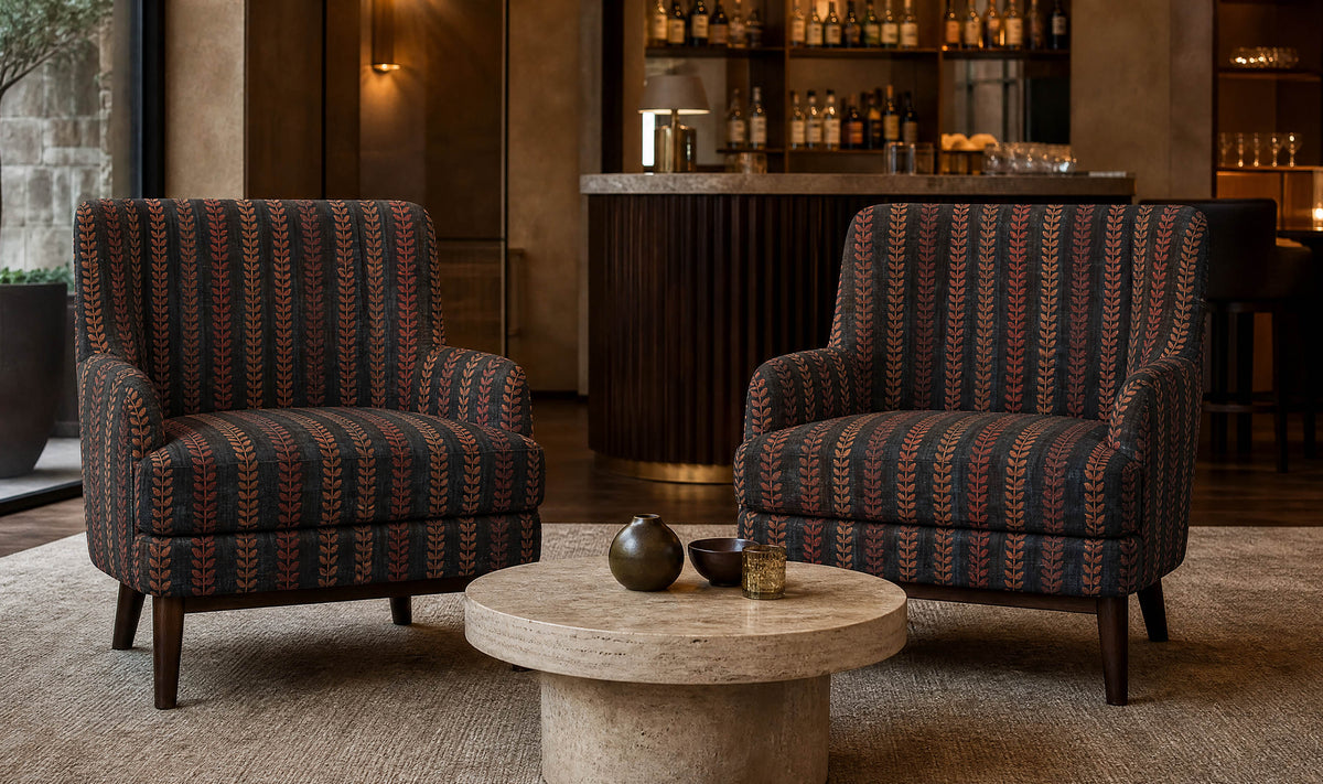 Lovverk Scandinavian leaf stripe upholstery fabric on statement lounge chairs