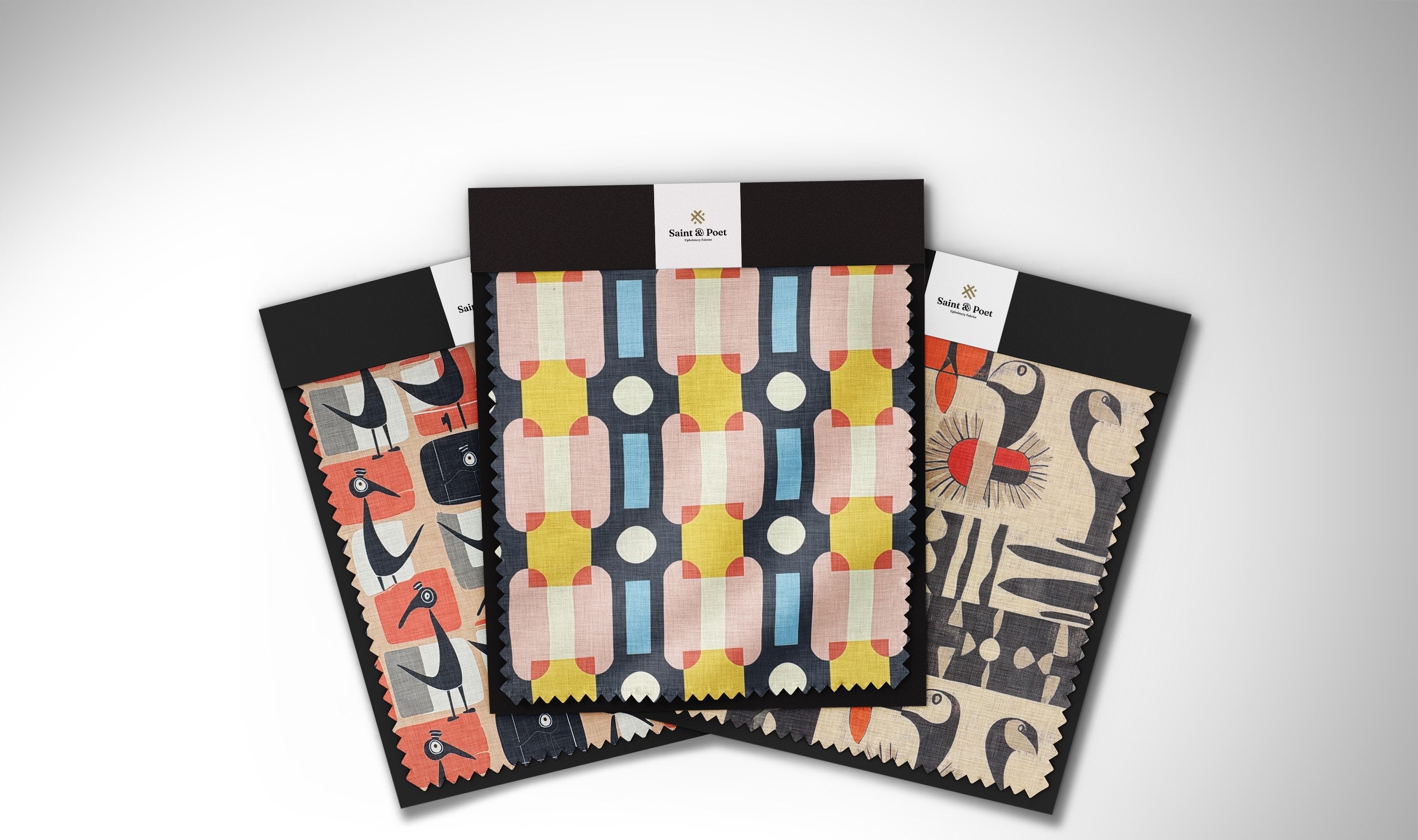 Luxury upholstery fabric collection showcasing a variety of textures, colors, and artistic designs – Saint & Poet