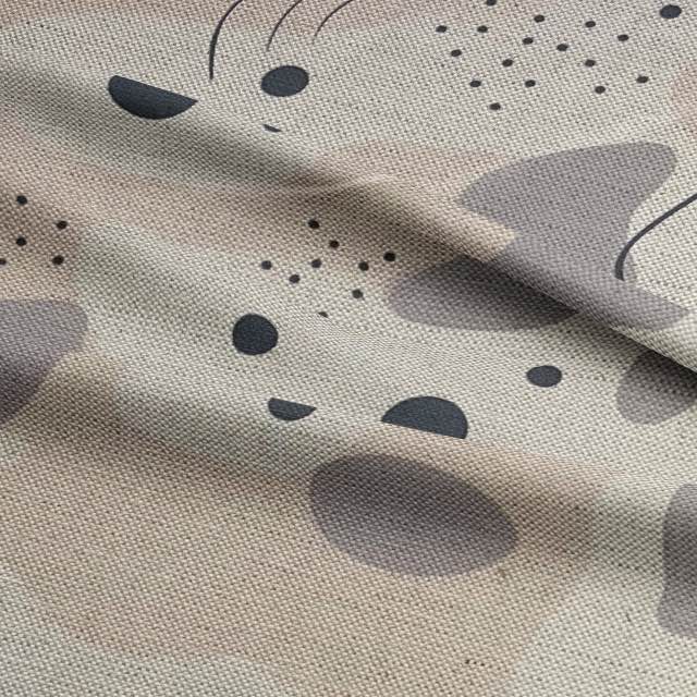 Luxury neutral-toned upholstery fabric in beige, taupe, and charcoal