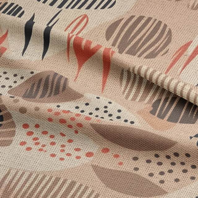 Luxury organic-patterned upholstery fabric featuring warm, earthy hues and artistic linework, perfect for statement seating and bespoke furniture projects.