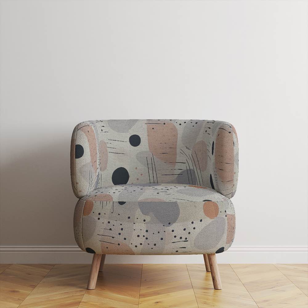 Accent chair upholstered in high-end abstract fabric, showcasing a refined minimalist design with tonal greys, subtle detailing, and modern appeal.