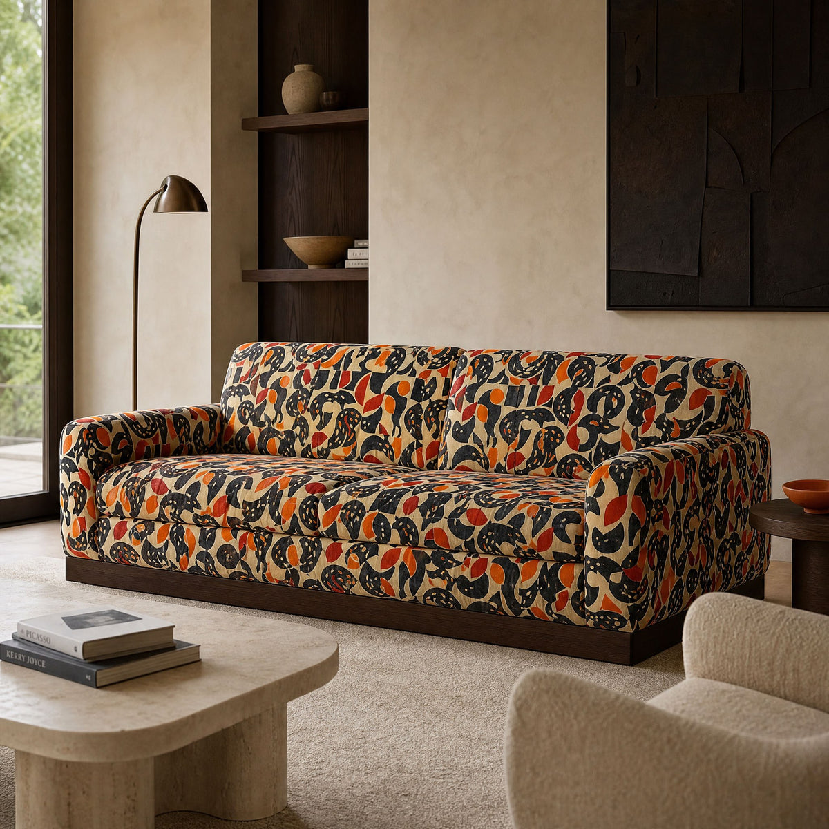 Sofa upholstered in Abstract No.18 graphic black orange and cream printed velvet