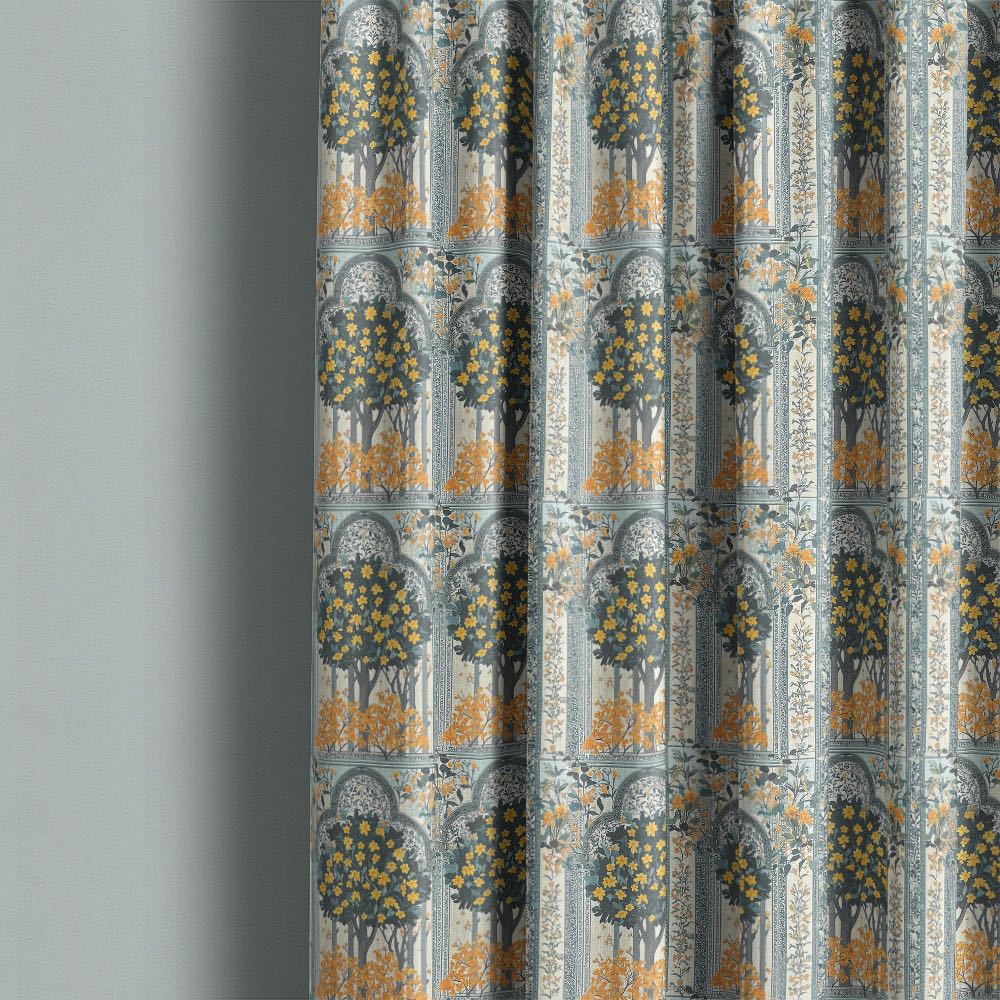 Agra No.14 curtain fabric hanging in interior setting with Indian botanical arch pattern and warm yellow floral detailing