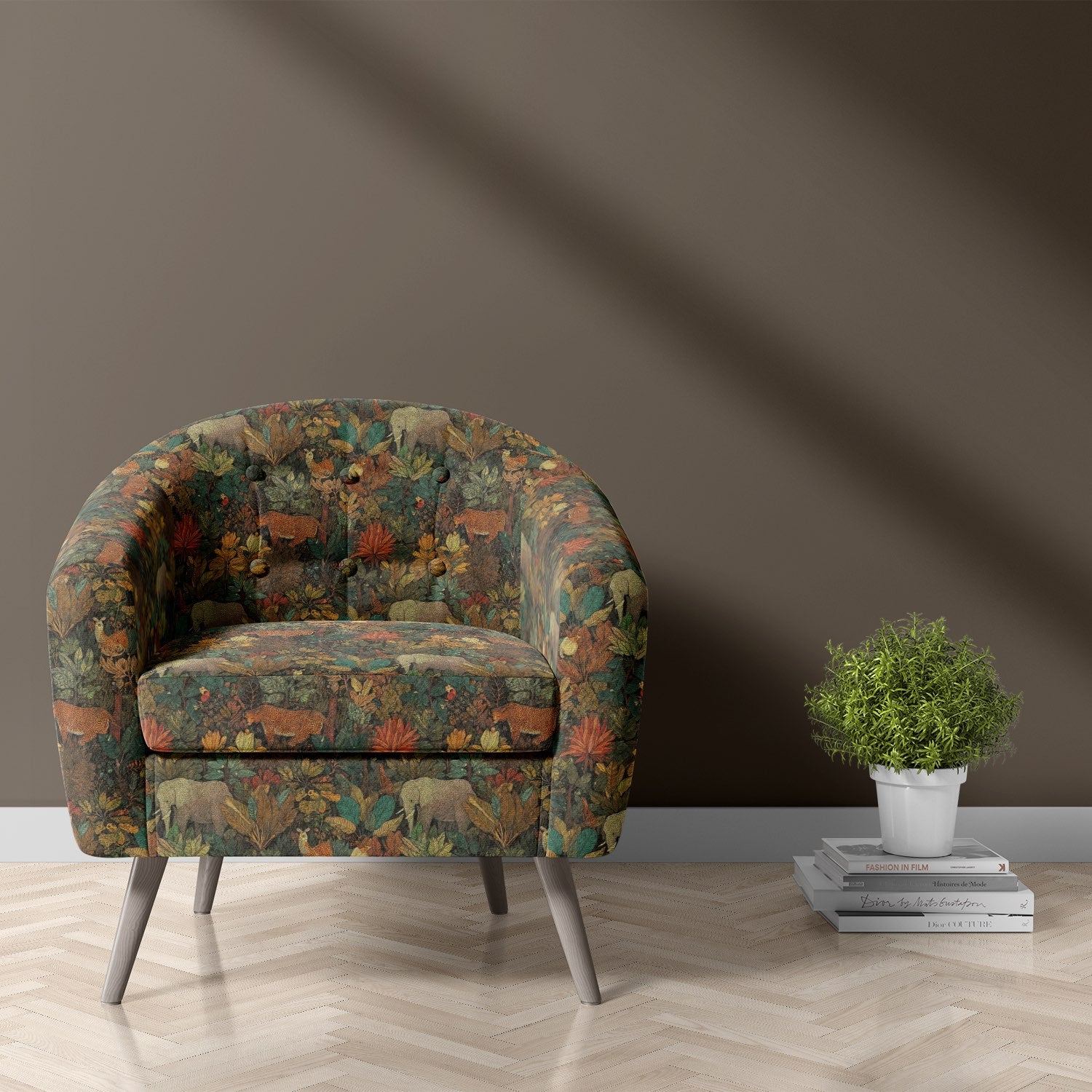 Armchair upholstered in Animals No.5 jungle animal upholstery fabric in green, ochre, and teal