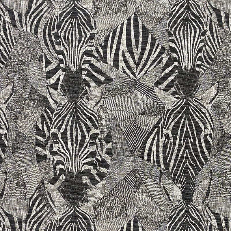 Black zebra patterned animal upholstery fabric with abstract linework and modern safari style