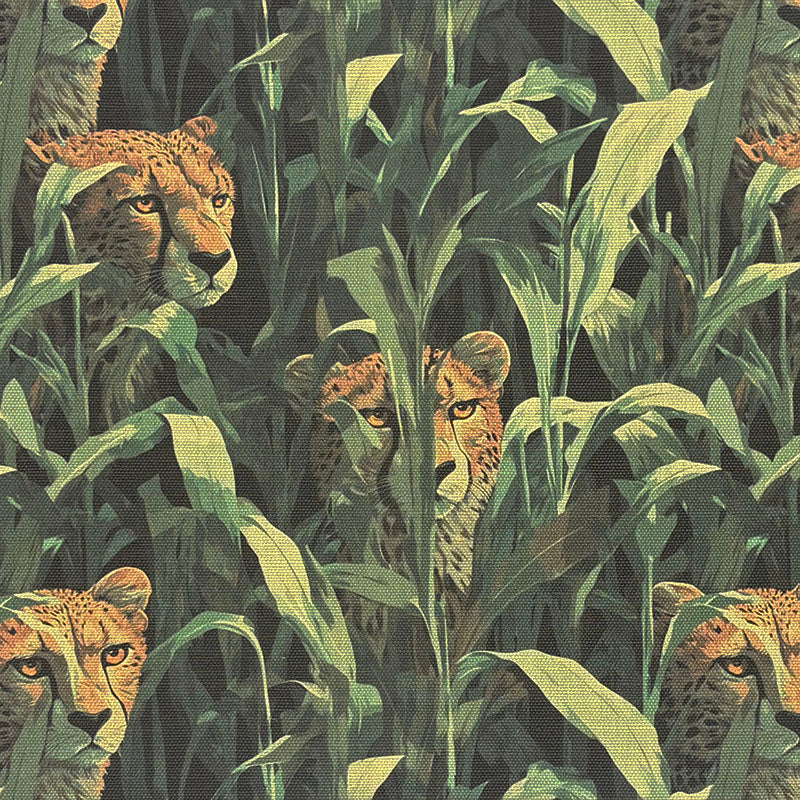 Close-up of cheetah jungle print on green animal upholstery fabric with layered leaves and wild cat faces