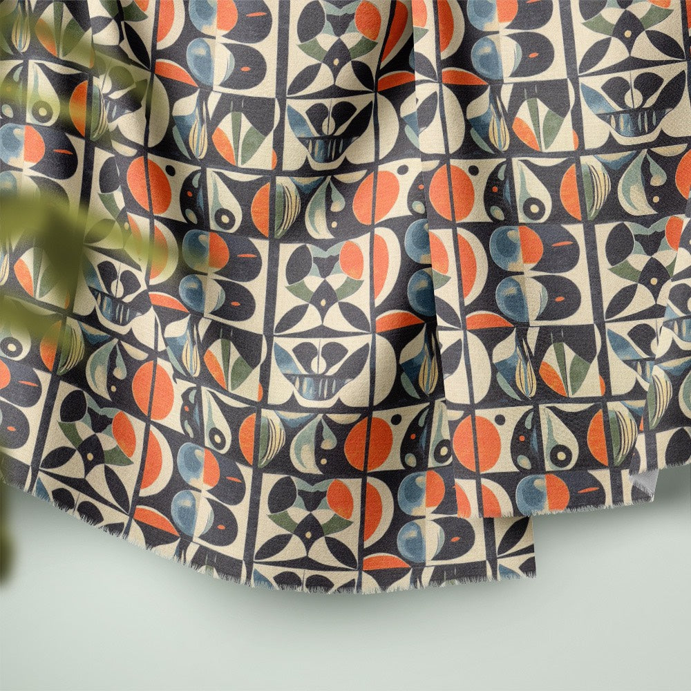 Atelier No.4 curtain fabric draped showing repeating geometric tile pattern in charcoal, teal and orange