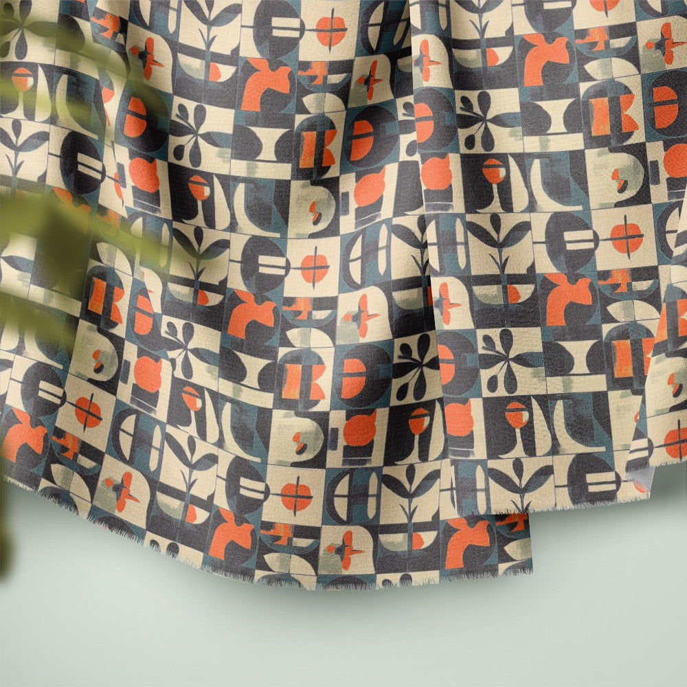 Atelier No.9 tiled curtain fabric showing soft drape and repeating graphic tile pattern in charcoal, stone and warm orange