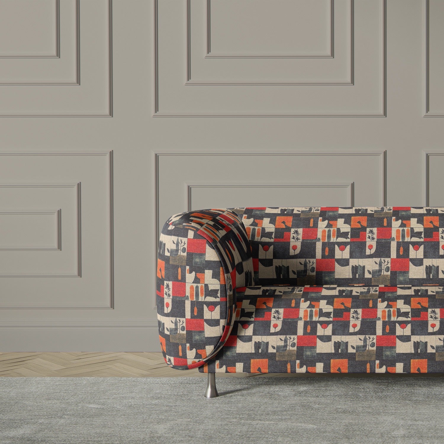 Armchair upholstered in Atelier No.10 fabric – graphic artist-inspired patchwork in warm terracotta and charcoal