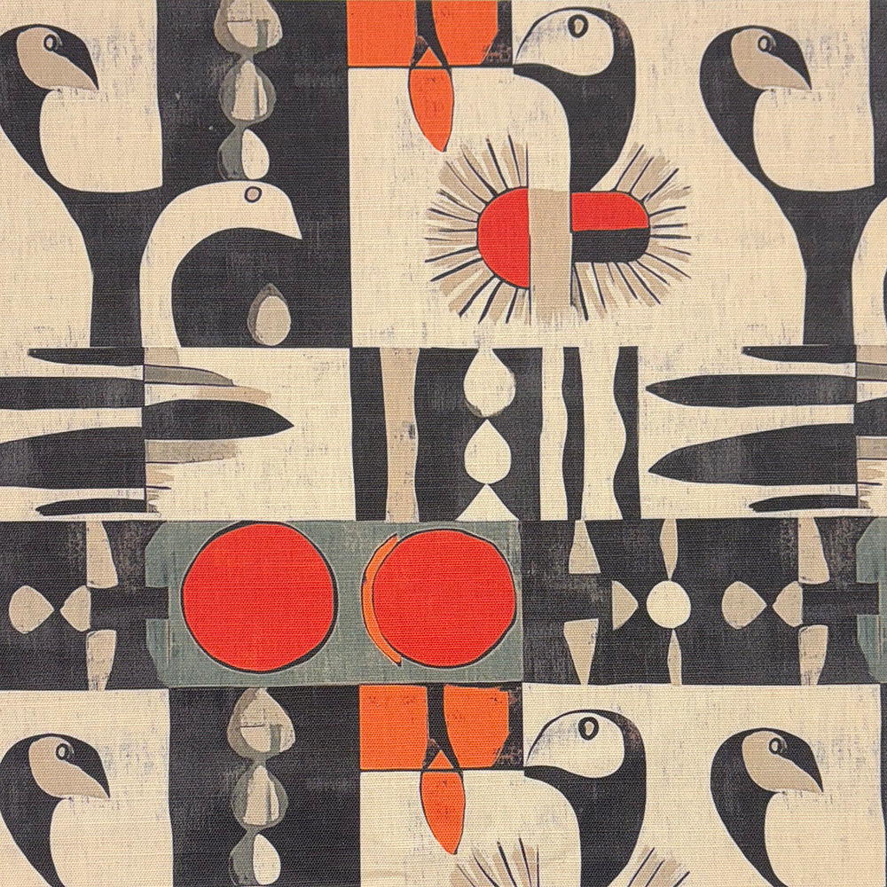 Bauhaus-style bird and circle print upholstery fabric in black, cream, and red – flat lay textile swatch
