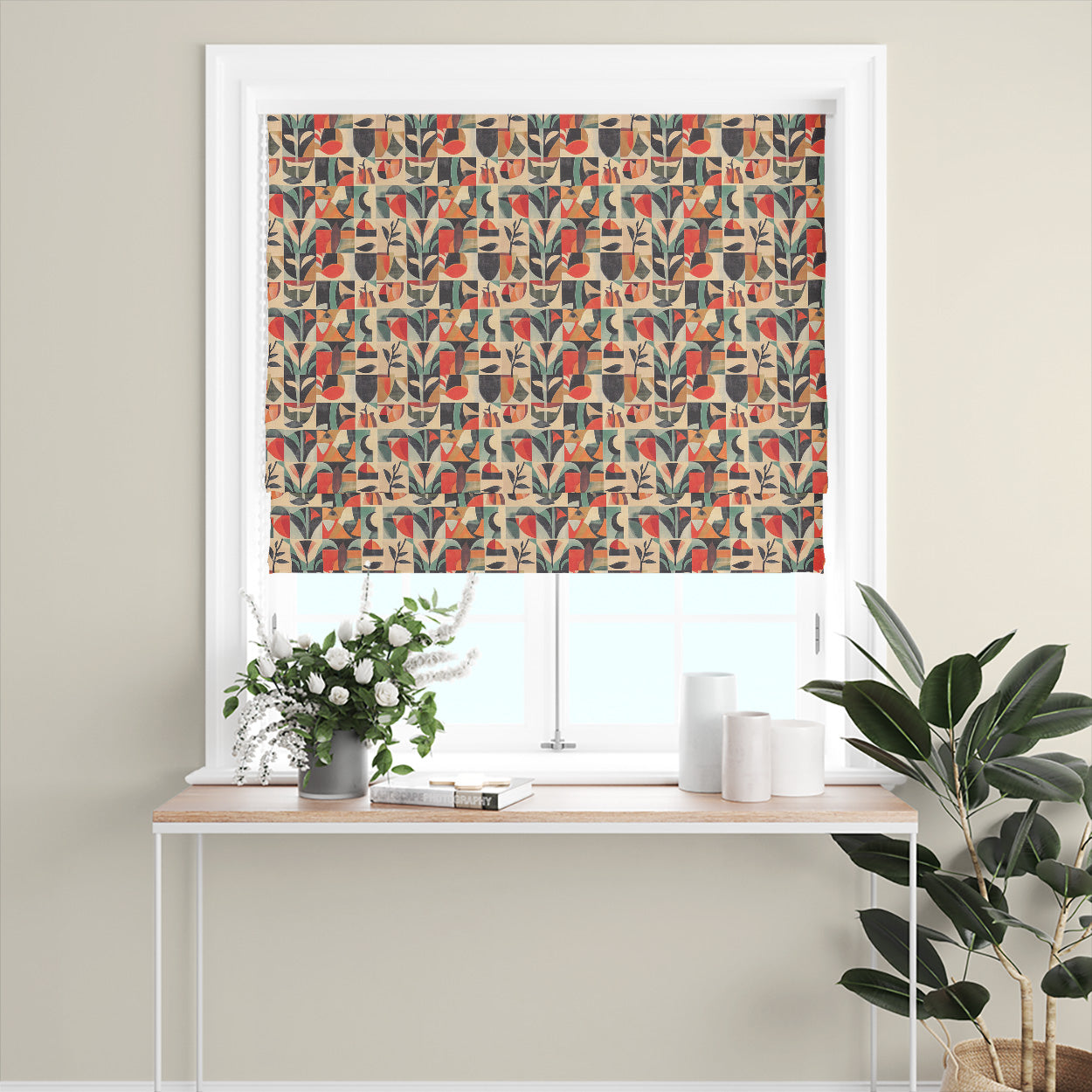 Atelier No.3 curtain fabric Roman blind in interior setting featuring repeating tile pattern with warm multicoloured abstract shapes