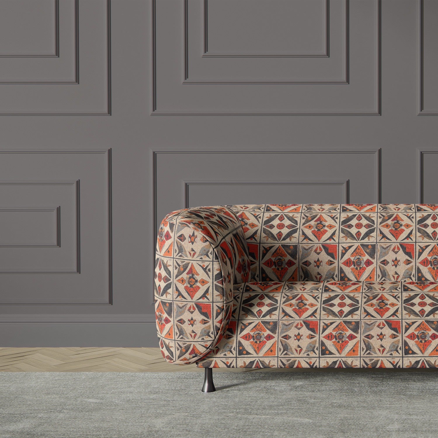 Sofa upholstered in Atelier No.7 – warm-toned upholstery fabric with artisan tile pattern in a modern living space.