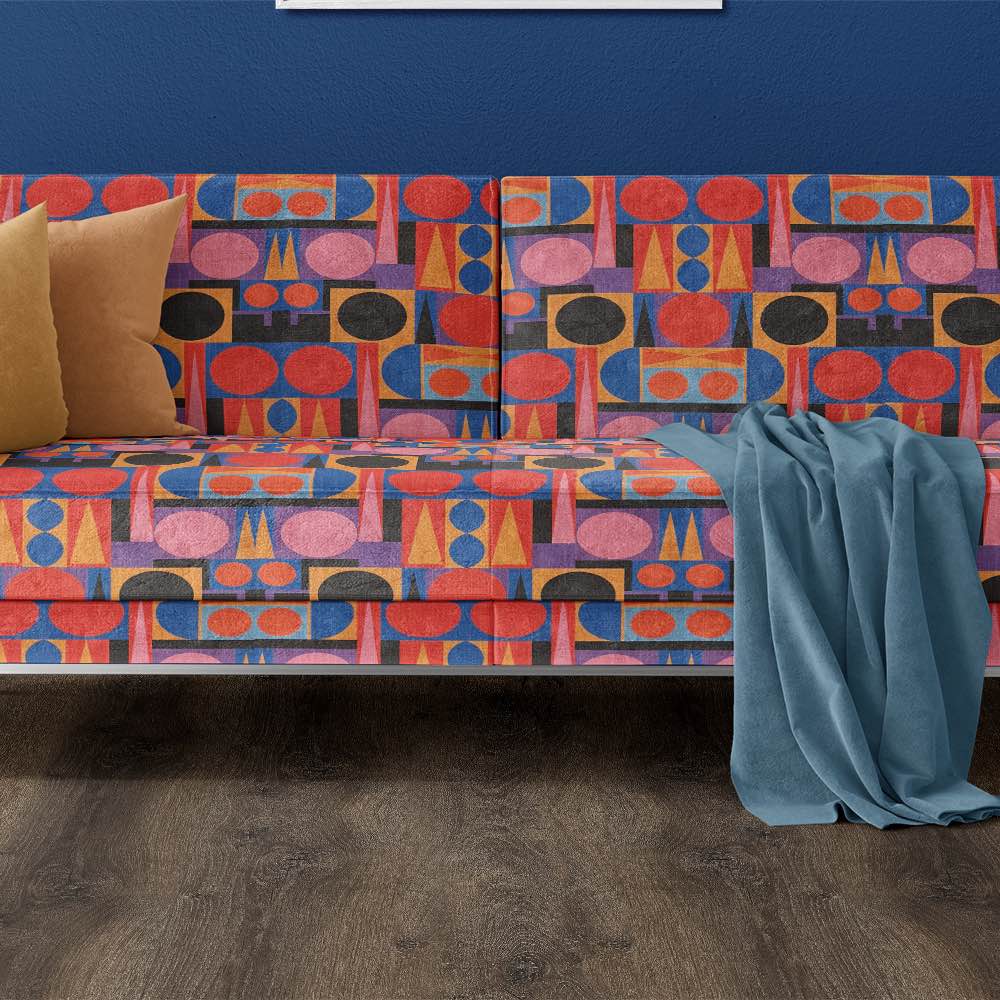 Statement sofa upholstered in Avant No.17 geometric fabric by Saint and Poet – modern cubist design for bold interior styling