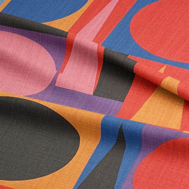 Detailed texture of Avant No.18 upholstery fabric showing layered geometric forms and vivid colour palette