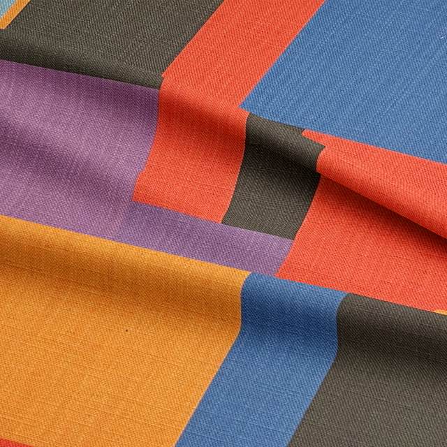Close-up of Avant No.19 upholstery fabric showing high-quality weave and bold cubist colour blocks for statement seating