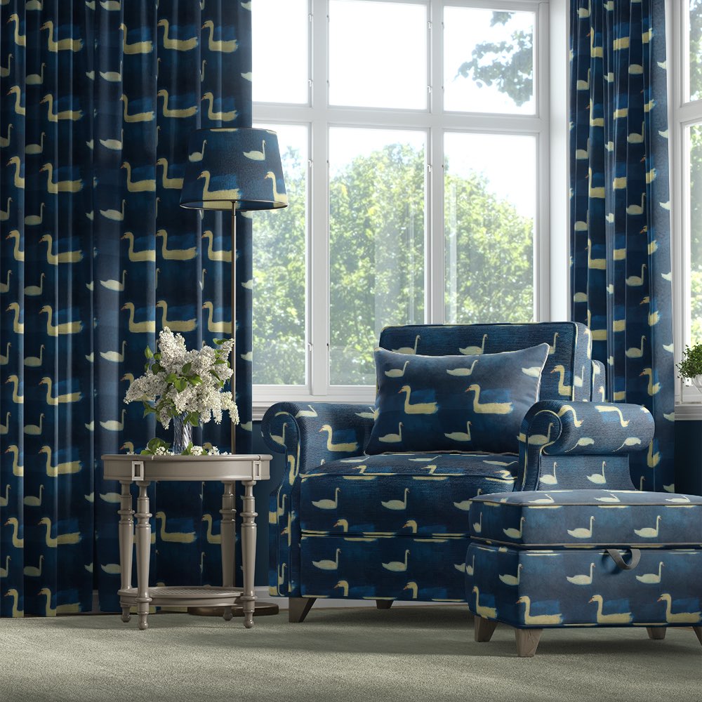 Velvet bird fabric used on armchair, ottoman and curtains with swan pattern on navy blue velvet – Aviary No.5 velvet bird fabric