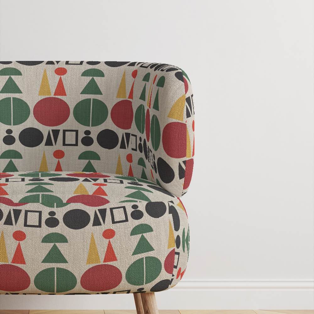 Armchair upholstered in Avignon No.15 fabric – bold mid-century statement chair design