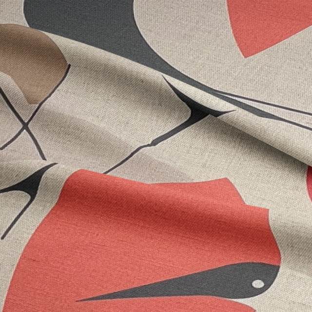 Upholstery Fabric close-up showing stylised bird motifs and natural tones