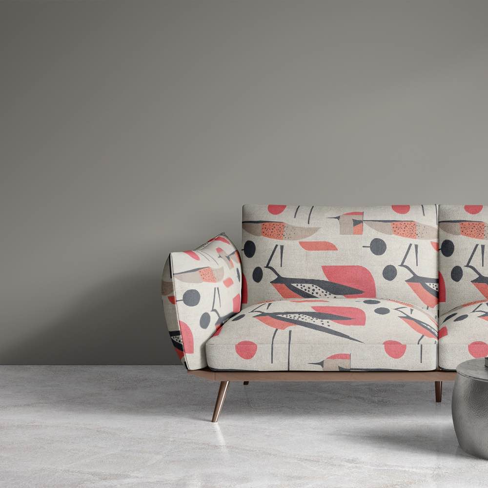 Modern sofa upholstered in Bird No.12 abstract avian design fabric