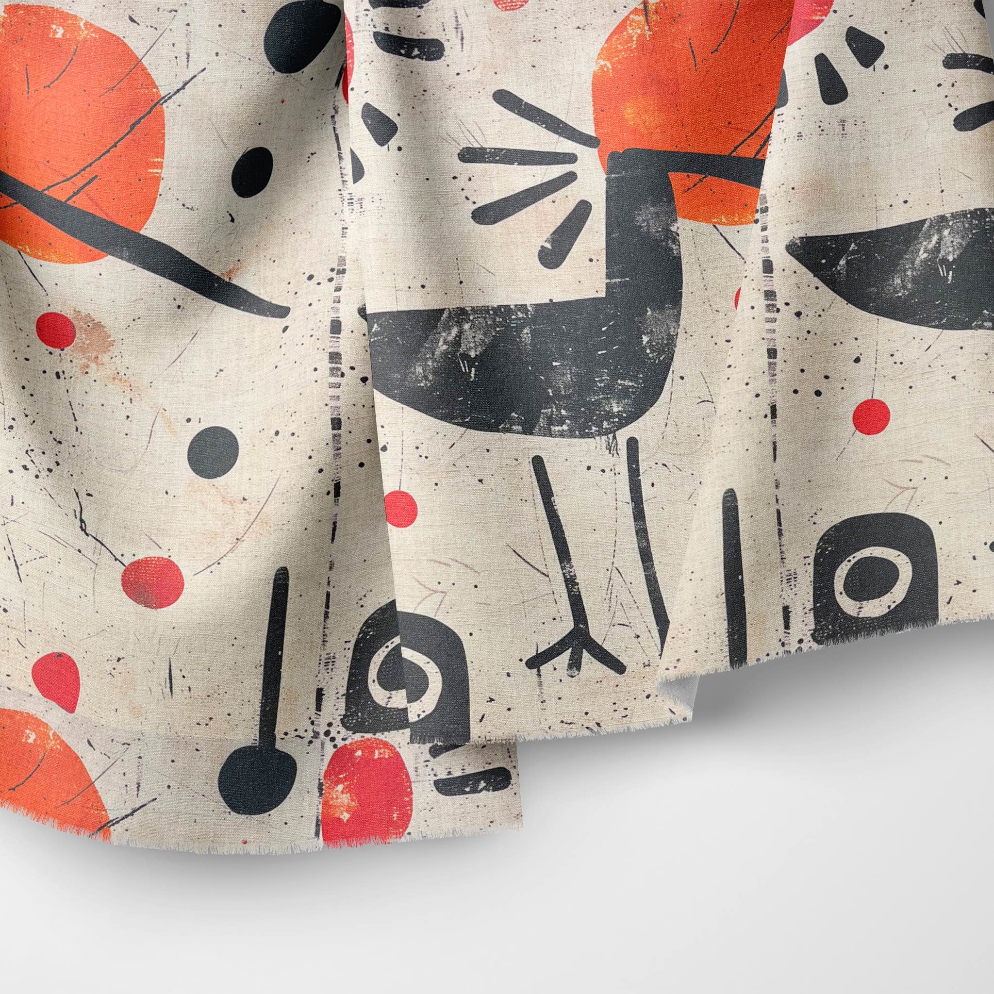 Close-up of Bird No.1 — luxury upholstery fabric with bold red, black and off-white print