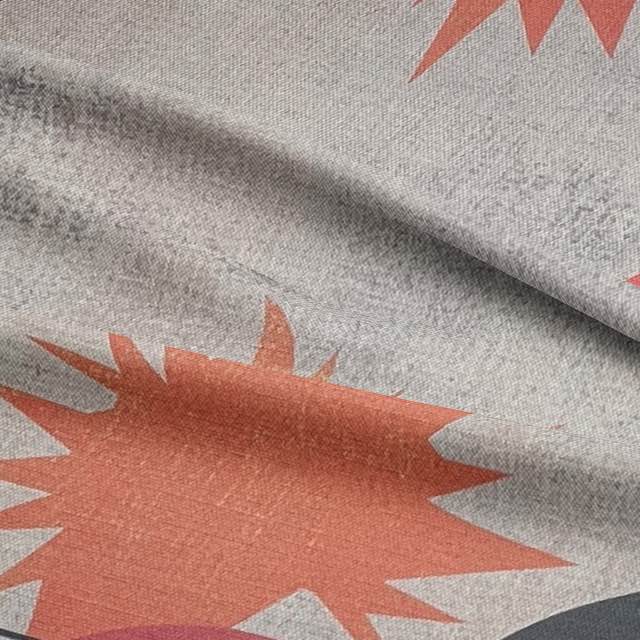 Detail of woven upholstery fabric showing abstract sunburst pattern