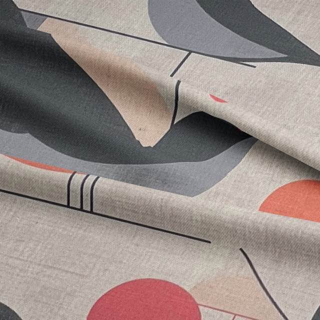 Close-up of Bird No.22 fabric showcasing charcoal and clay bird motifs