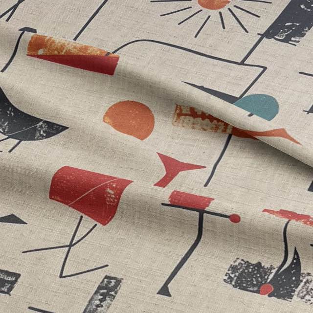 Close-up of Bird No.2 fabric – red and black birds with sun icons on linen-style upholstery fabric