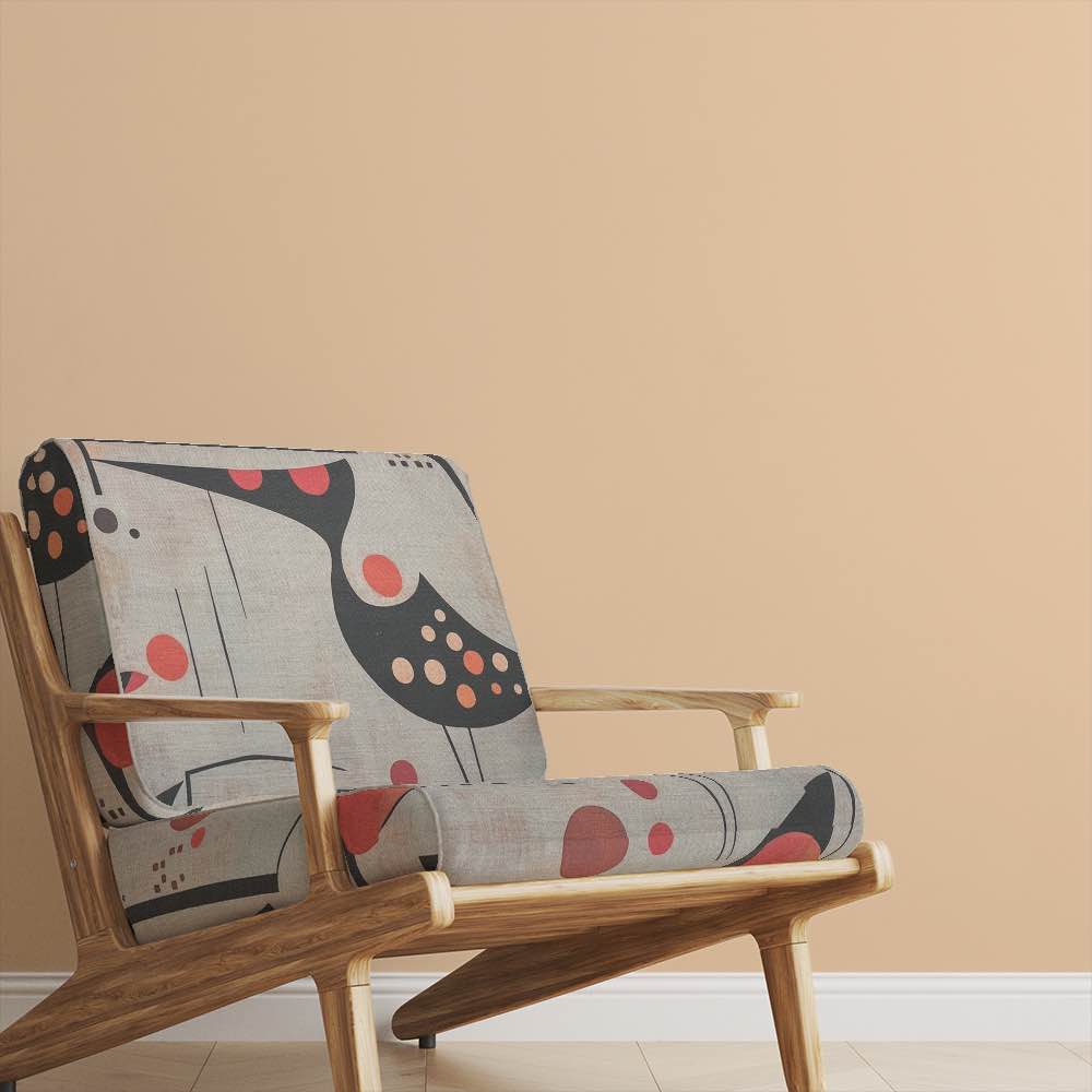 Accent chair upholstered in Bird No.7 fabric in a minimalist beige-toned interior