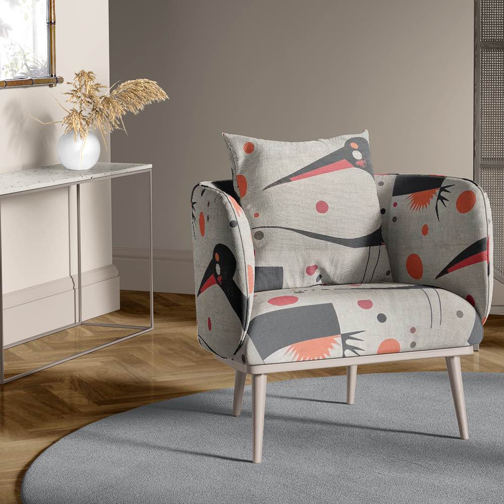 Accent chair upholstered in Bird No.8 fabric, styled in a minimalist neutral-toned interior