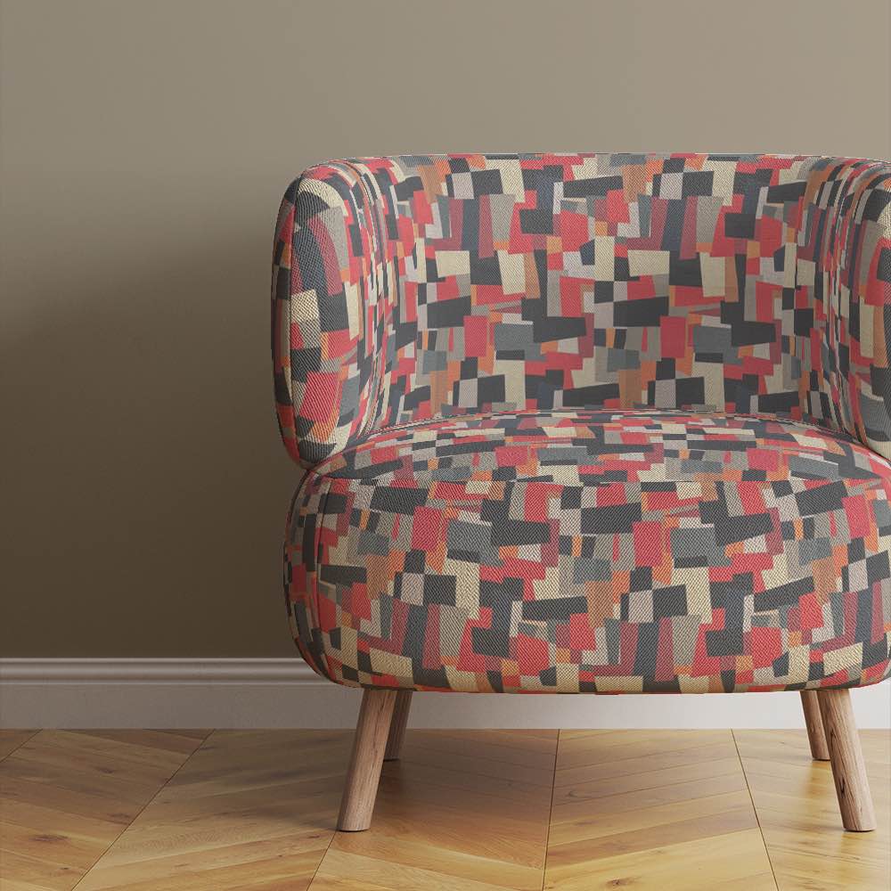 mid-century-modern-chair-upholstered-in-collage-no-1-fabric-featuring-layered-abstract-rectangles