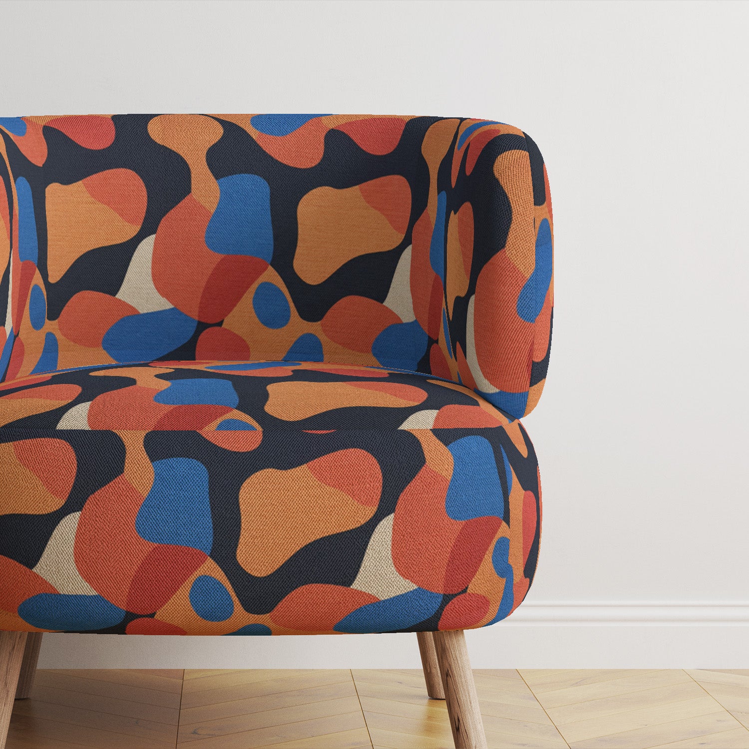 accent-chair-upholstered-in-creation-no-1-abstract-organic-fabric-against-dark-wall-modern-interior-settings