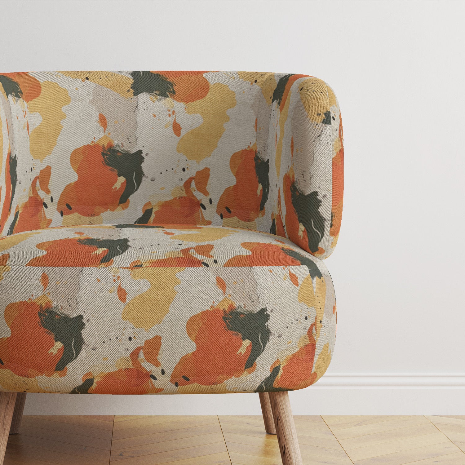 accent-chair-upholstered-in-creation-no-3-fabric-against-charcoal-wall-on-wood-flooring