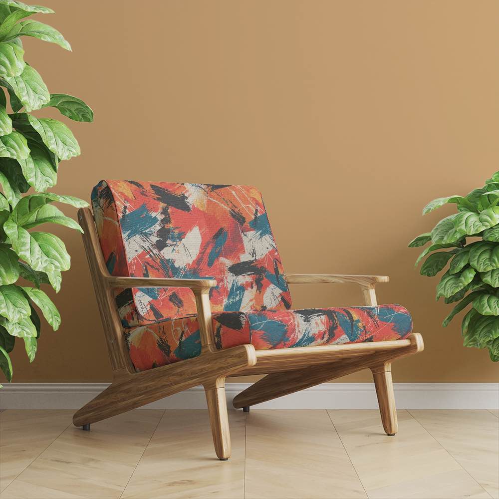 Contemporary armchair upholstered in Dash No.9 fabric in warm-toned interior setting