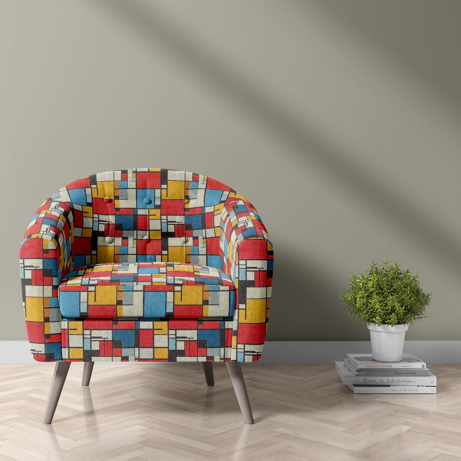 Upholstered armchair in bold multicoloured geometric upholstery fabric – Dessau No.21