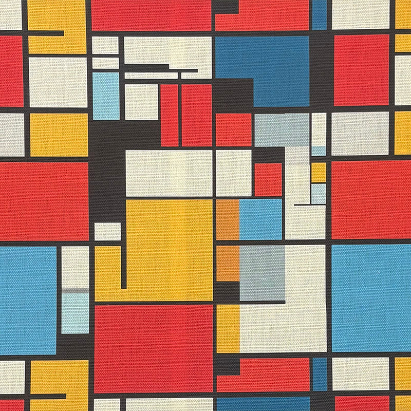 Multicoloured geometric upholstery fabric with Bauhaus-style block pattern in red, yellow, blue and black – Dessau No.21