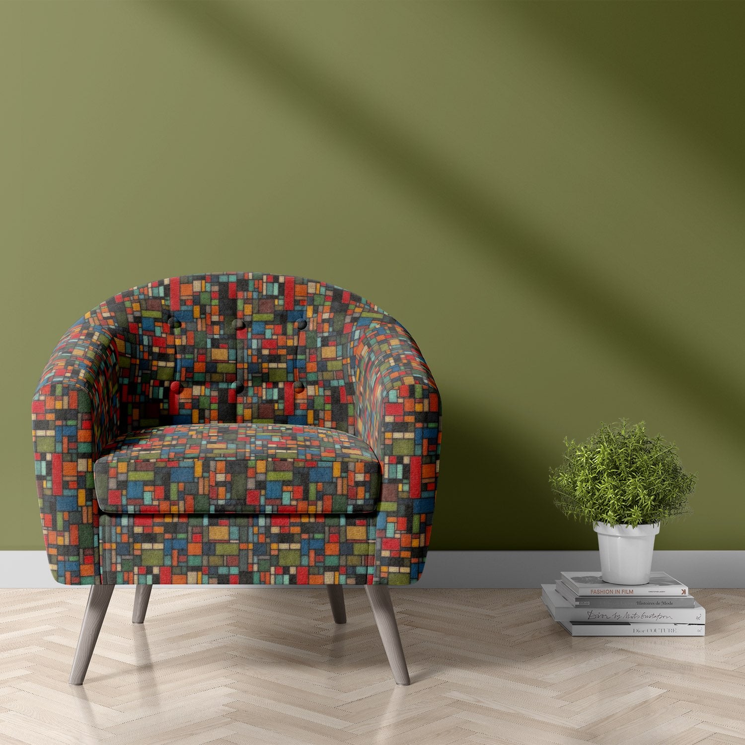 Statement upholstery fabric armchair featuring Bauhaus-inspired geometric design with multicoloured rectangular pattern in a modern interior