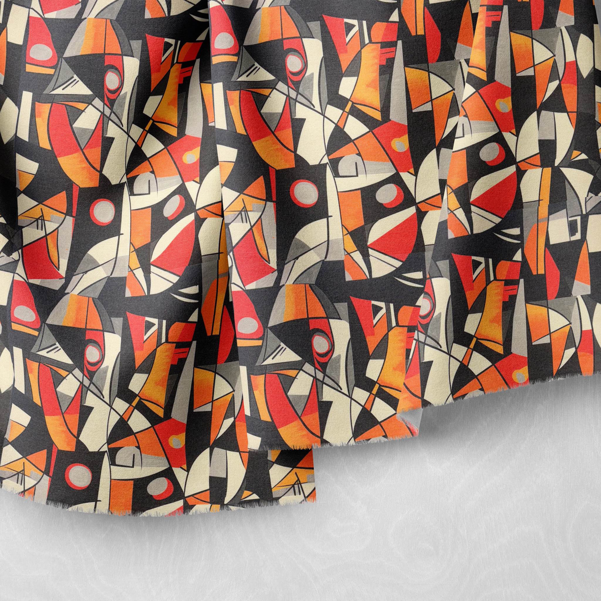 Draped detail of Exhibite No.17 with striking orange and charcoal graphic shapes