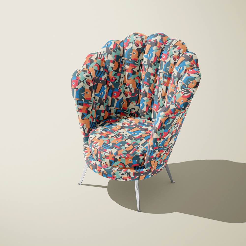 Exhibite No.6 abstract upholstery fabric on curved accent chair in modern interior setting with sculptural silhouette