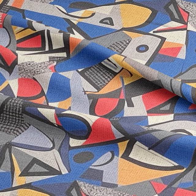 Folded fabric detail showing the layered brushstroke and shape pattern of Exhibite No.8 in bold primary colours