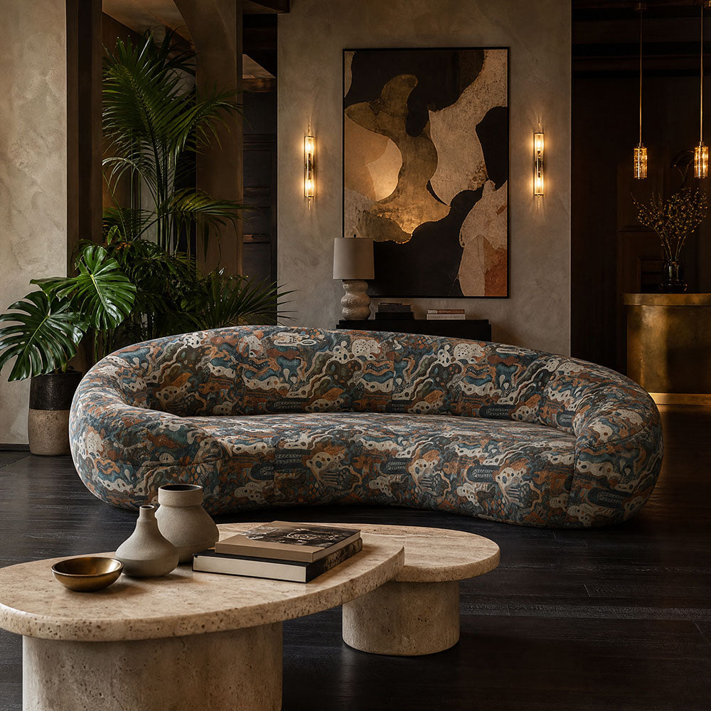 Fauve No.15 multicoloured abstract upholstery fabric on a sofa in a vibrant art-led interior