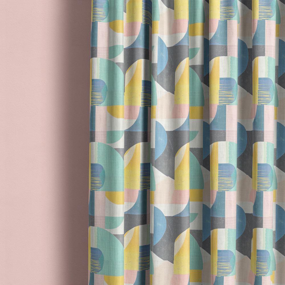Fresco No.1 multicoloured pastel curtain fabric showing soft drape in geometric Bauhaus interior setting