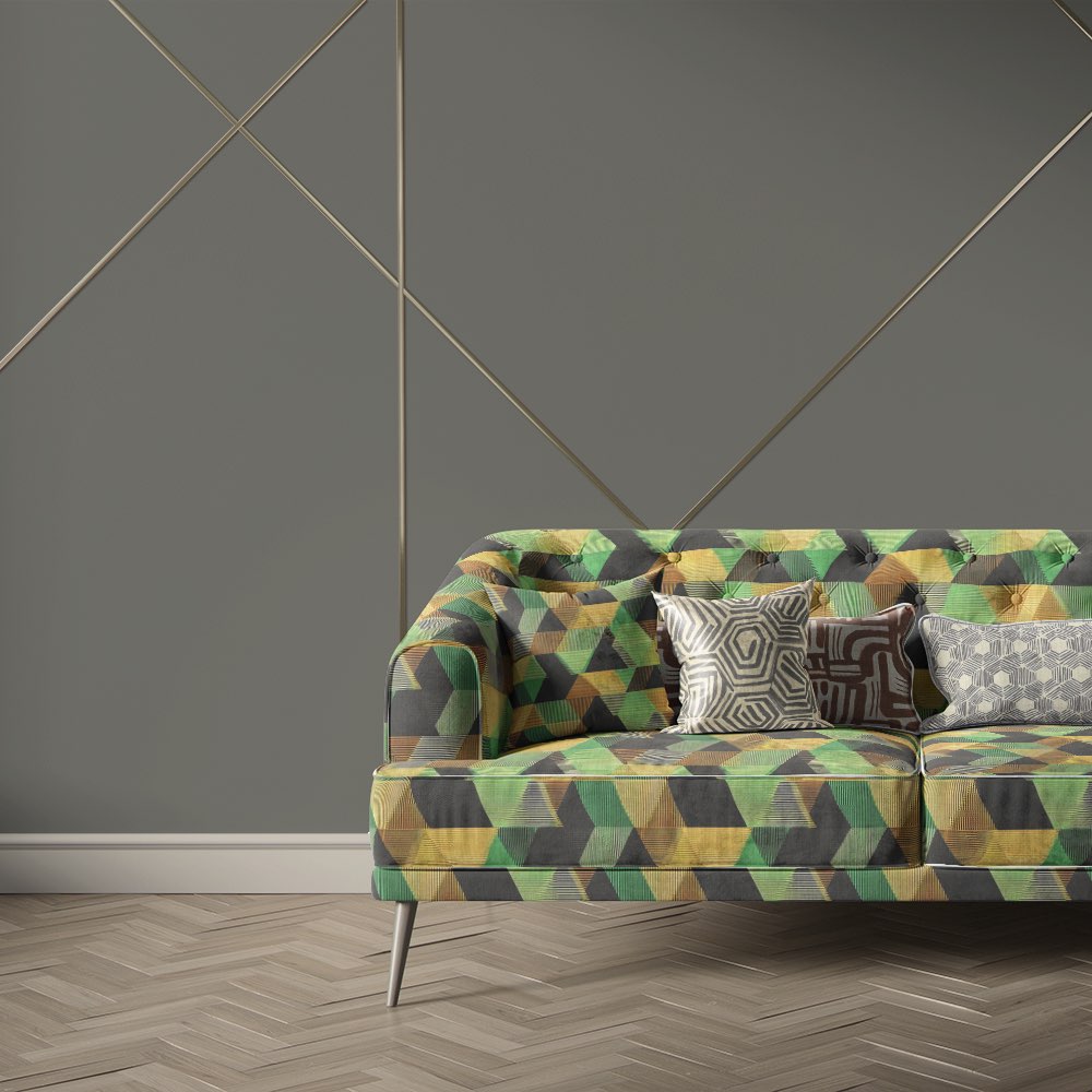 Geometric upholstery fabric used on modern sofa with multicoloured triangle pattern – Geometry No.1 upholstery fabric on contemporary furniture
