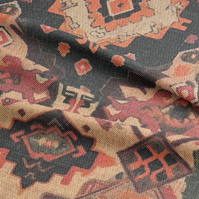 Bright bold upholstery fabric in terracotta and black with tribal design