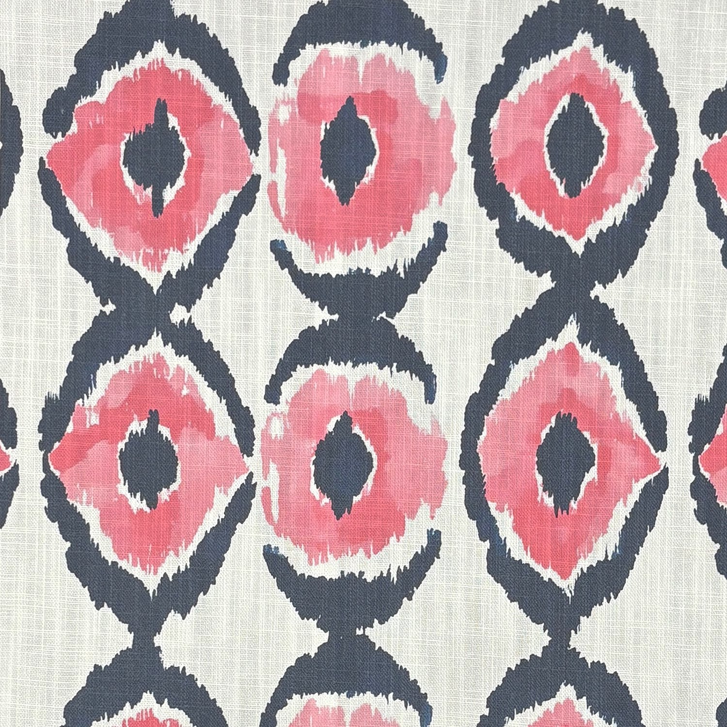 Flat image of Kilim No.25 upholstery fabric featuring coral and charcoal tribal ikat oval motifs on a natural linen-blend background