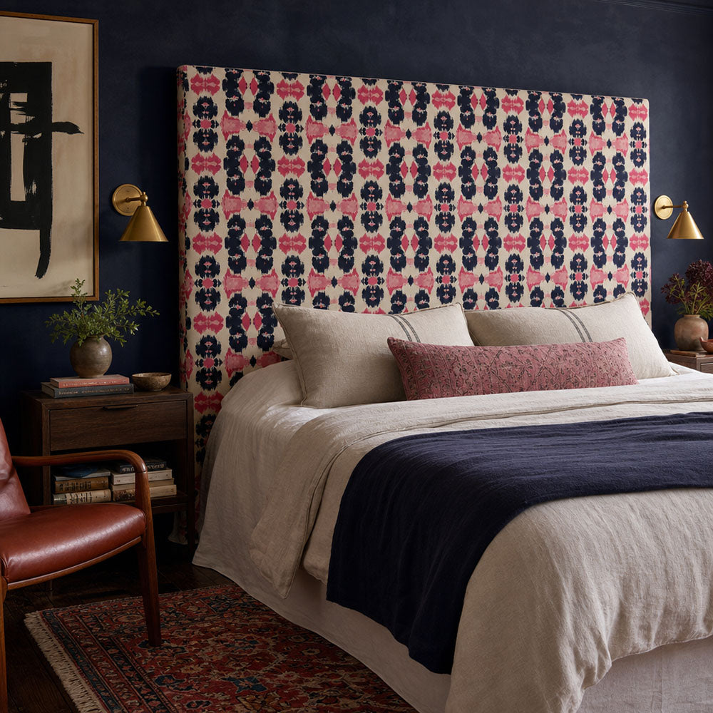 Headboard in Kilim No.31 Crib5 velvet fabric, featuring red, charcoal and blush Kilim design detail