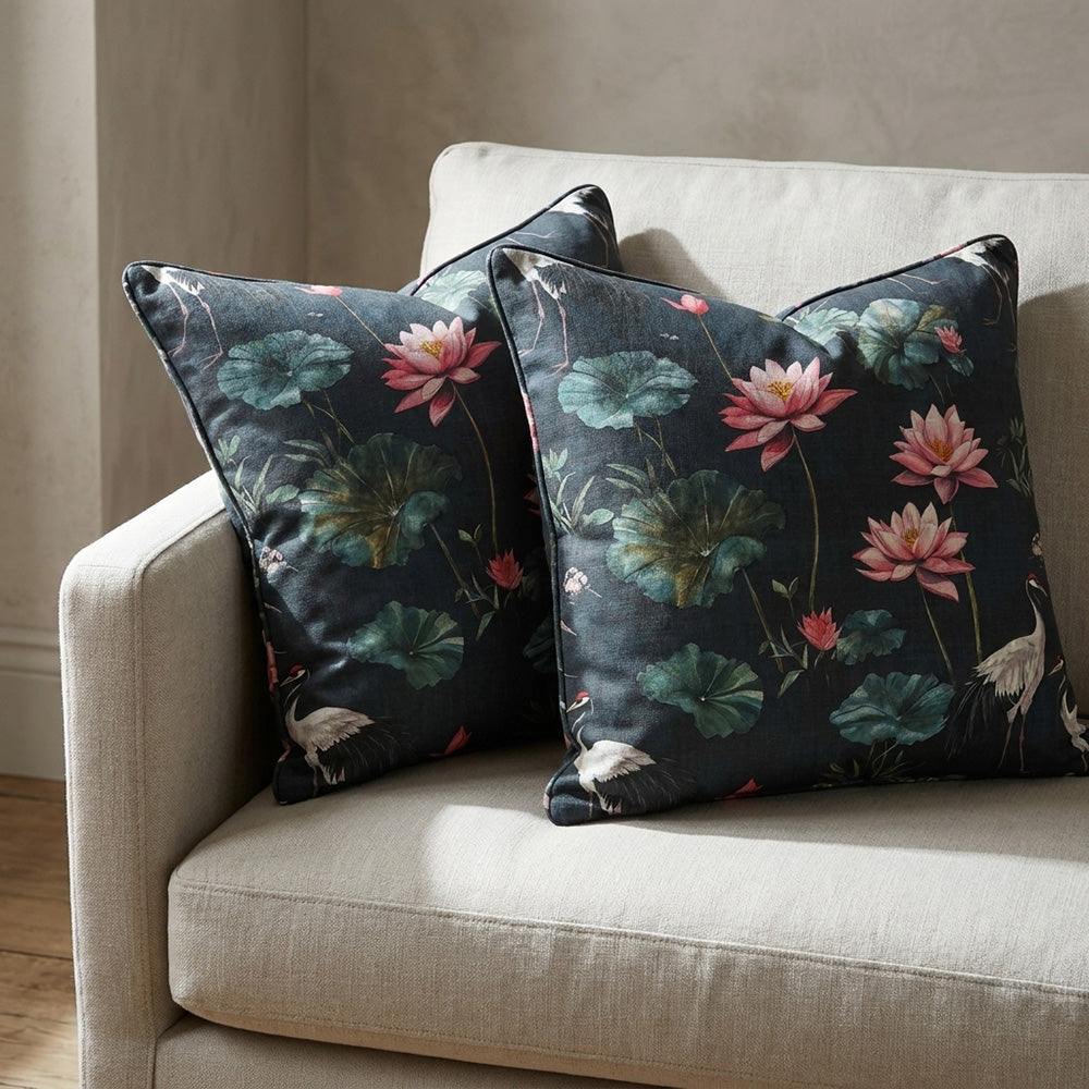 Lotus No.3 luxury floral linen curtain fabric shown on cushions with pink lotus flowers and cranes