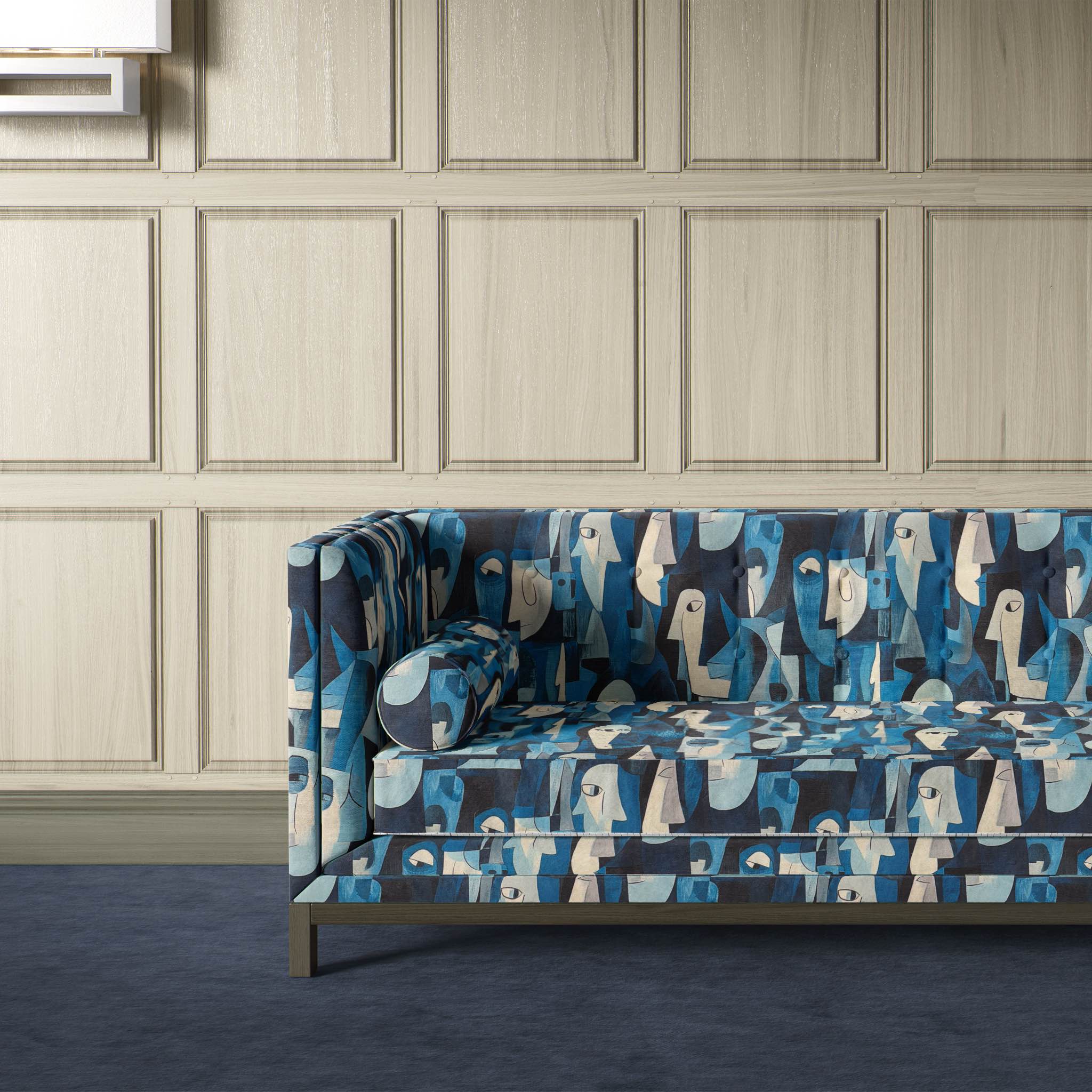 Sofa upholstered in Mougin No.15, ideal blue upholstery fabric for statement furniture