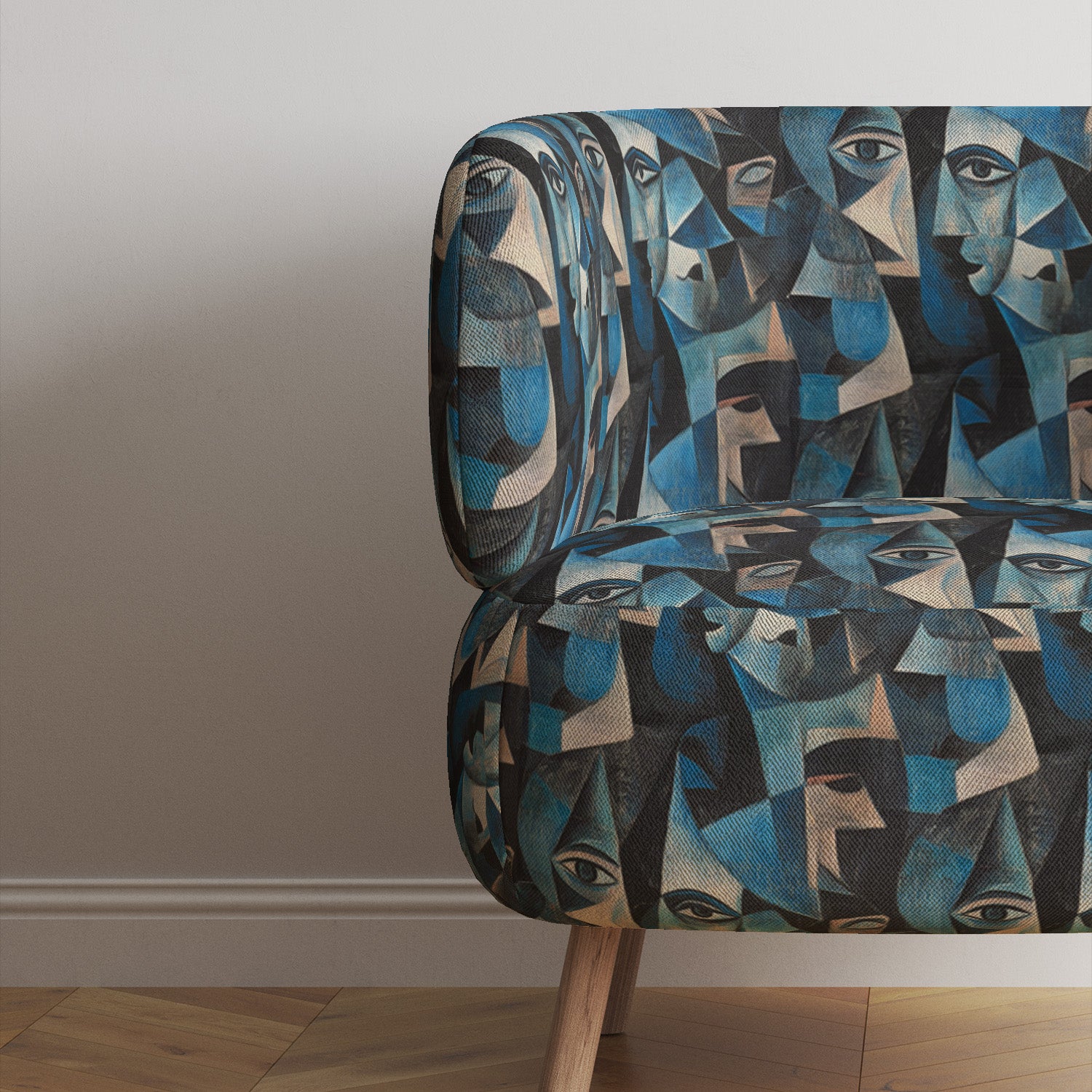 Sofa upholstered in Mougin No.22 fabric showing Picasso-inspired geometric portraiture