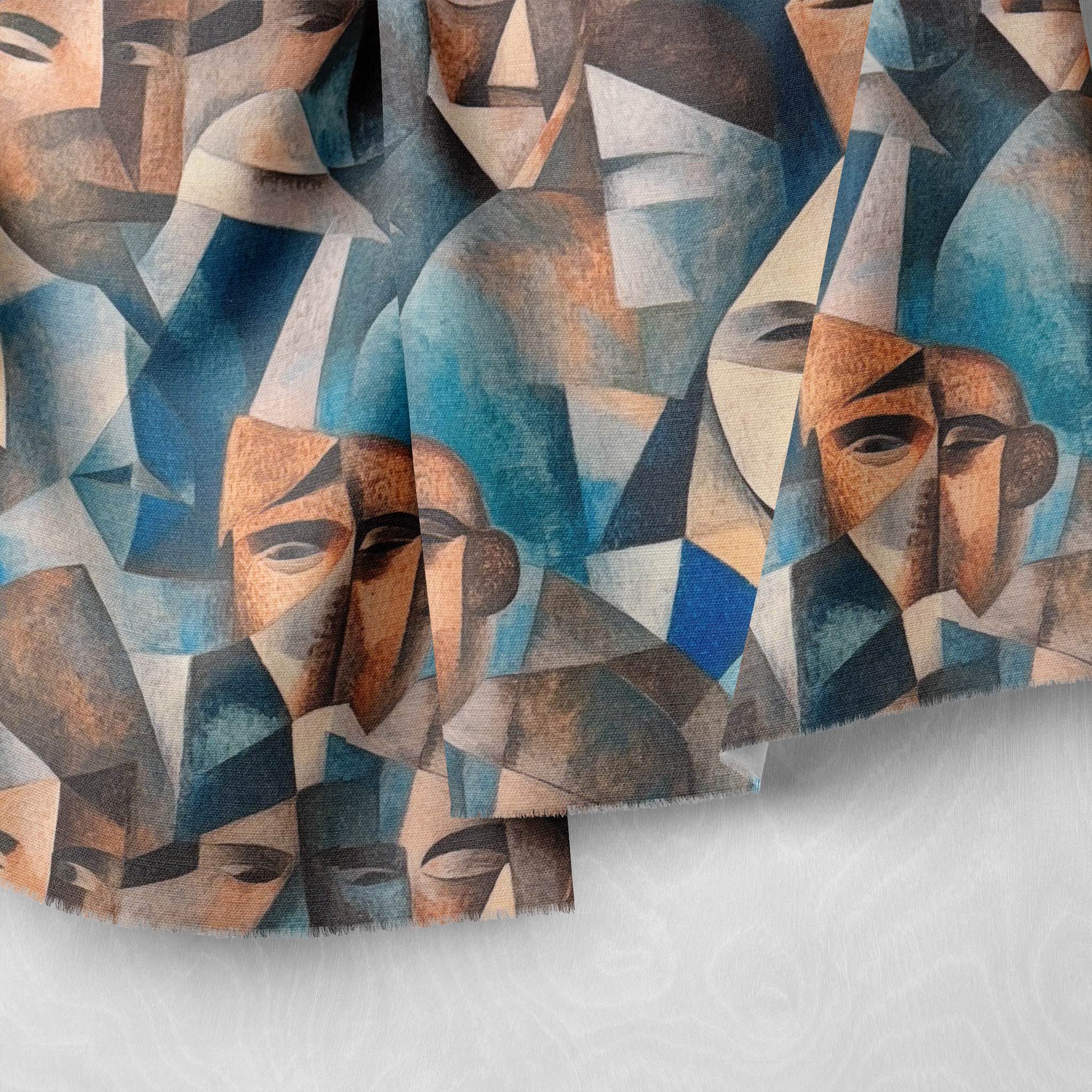 Draped detail of Mougin No.23 statement upholstery fabric highlighting tonal blues and angular artistic motifs