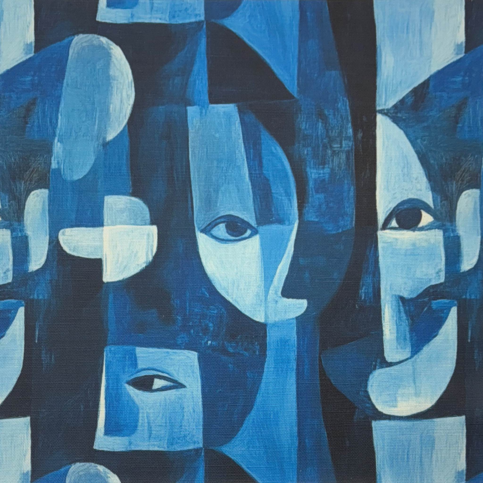 Flat lay of Mougin No.24 Upholstery Fabric with blue and white cubist face design